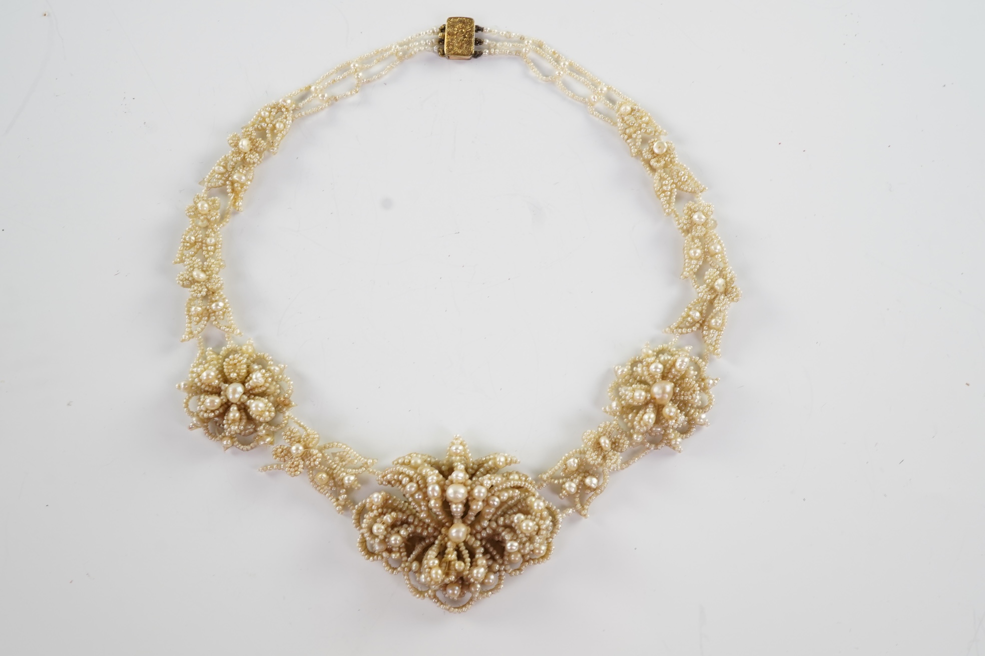 A Regency seed pearl necklace, brooch and pair of earrings, early 19th century
